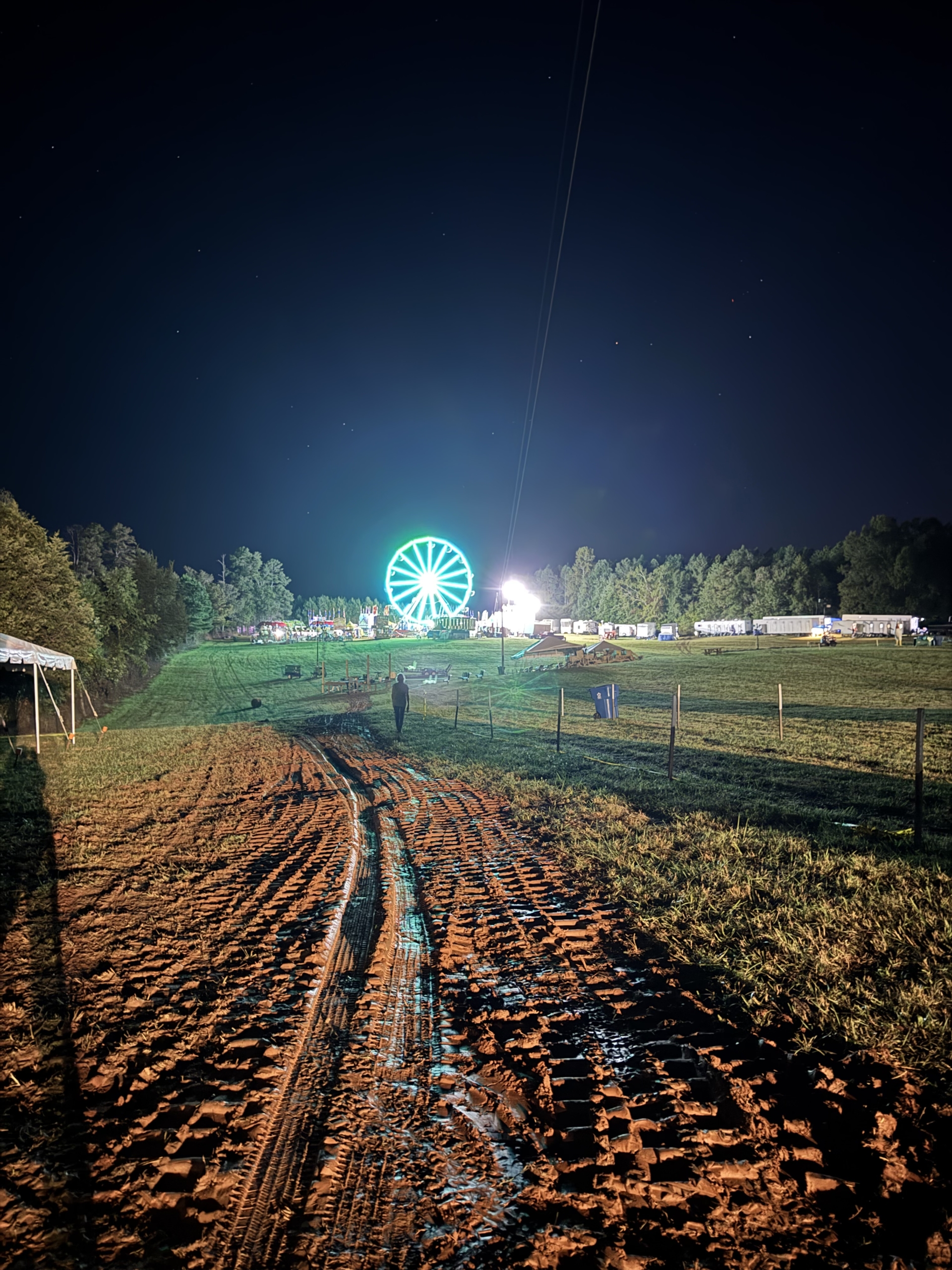 Ferris Wheel on hill at dark